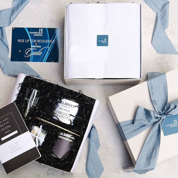 How do gift boxes contribute to the overall presentation of a gift